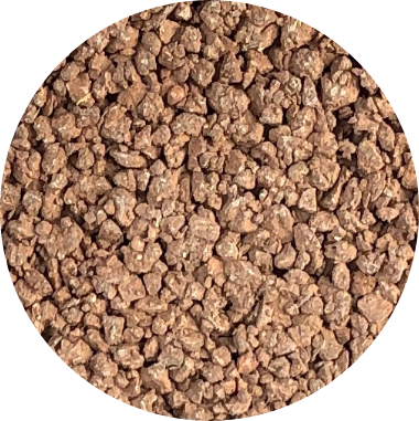 Campione rotondo di calcestruzzo drenante di color rosa, simile alle tipiche terre dell'area senese.